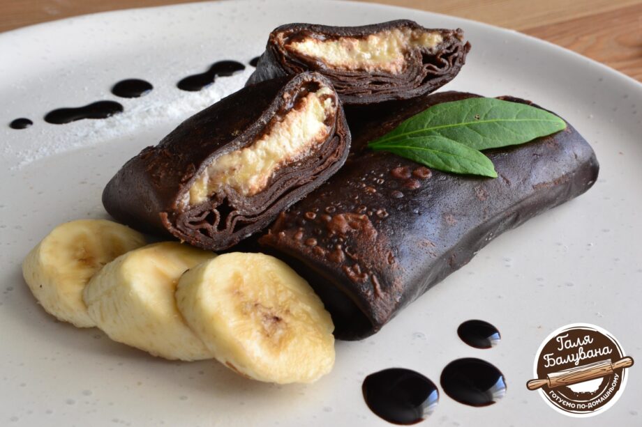Chocolate pancakes with banana and cheese