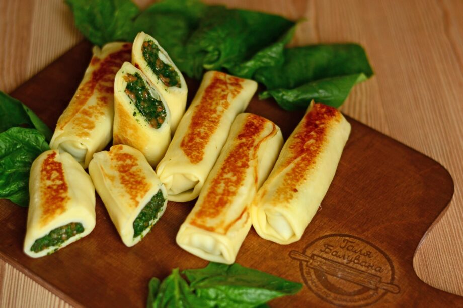 Pancakes with salmon and spinach